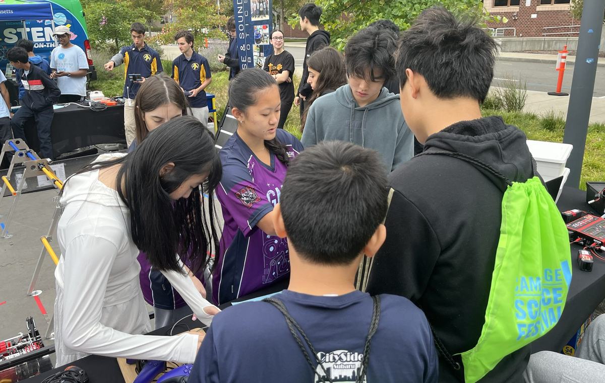 Mercury members talking with visitors at the Cambridge Science Festival